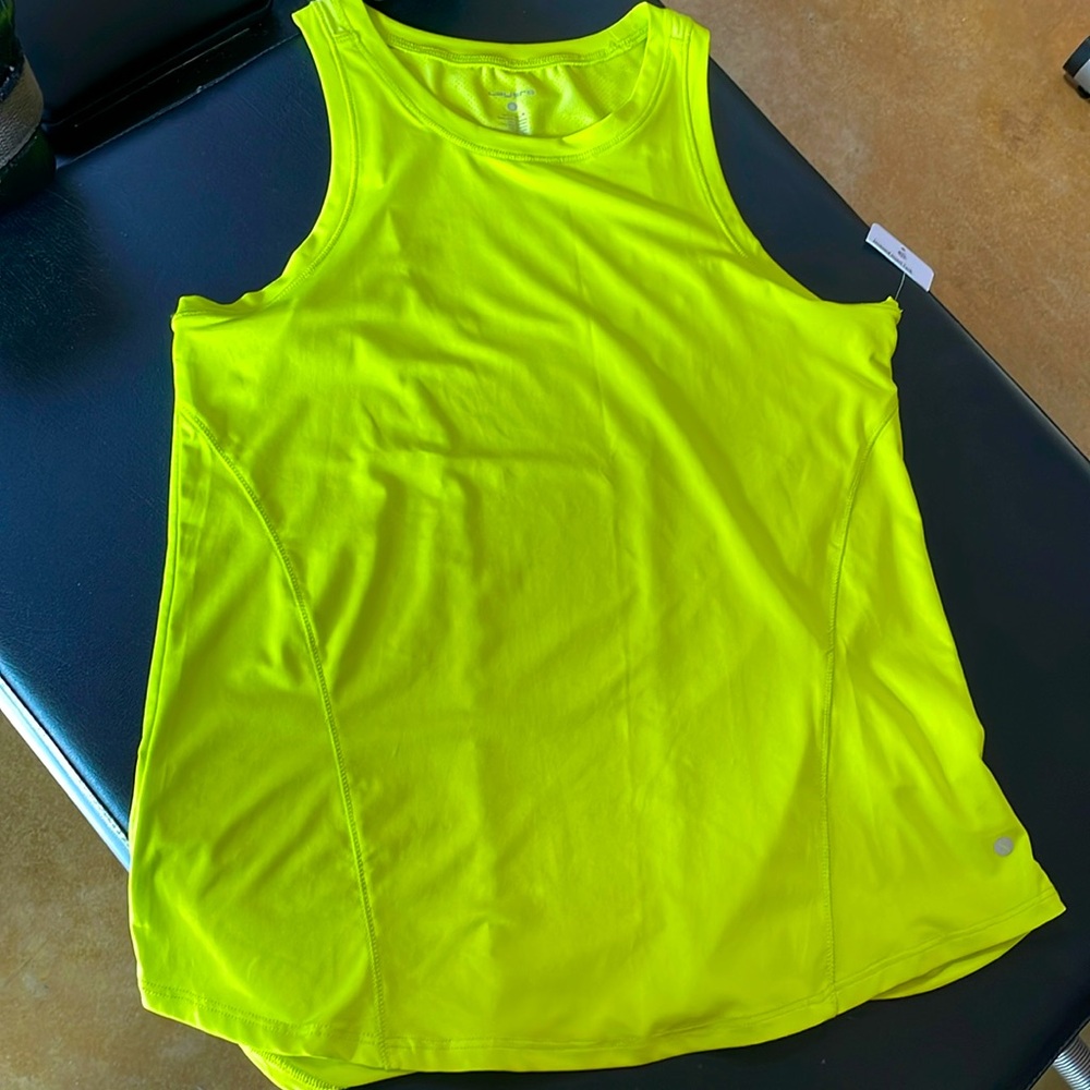 Longer hip length light weight wicking tank